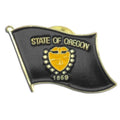Pin with 'State of Oregon' text and a yellow emblem on a black background