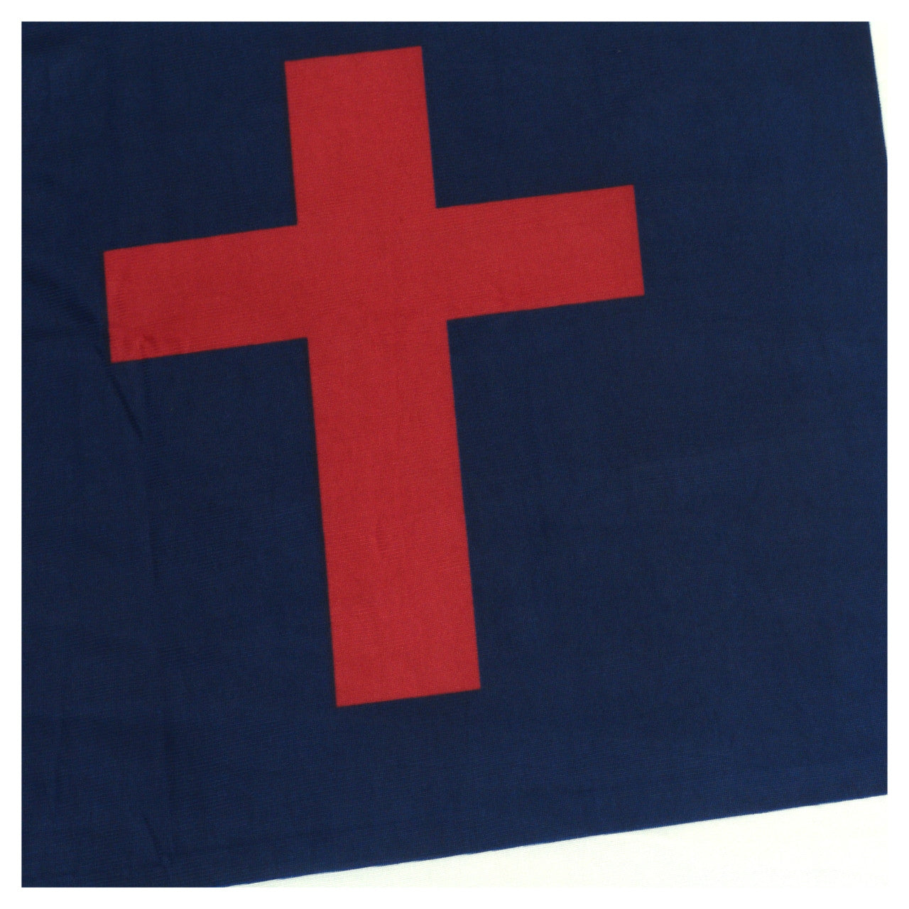 Navy blue fabric with a red cross on a white background