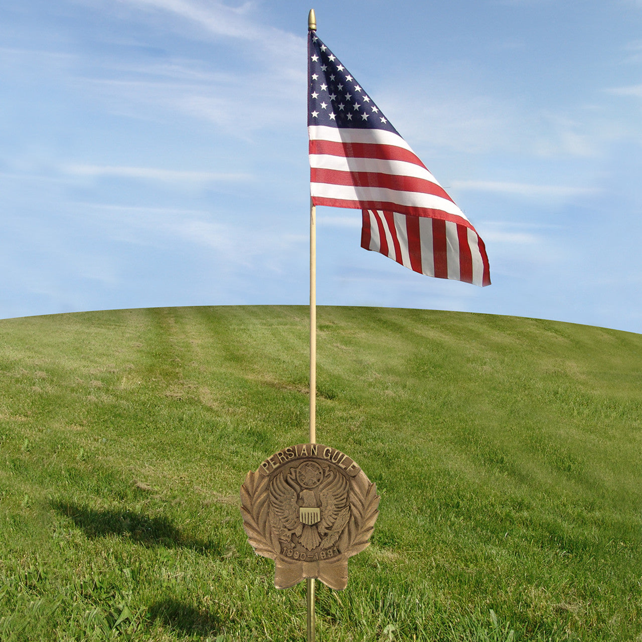American flag on a stick with a Persian Gulf grave marker.