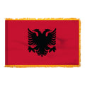 A red flag of Albania with a black double-headed eagle in the center