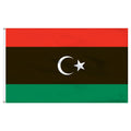 Red, black, and green flag of Libya with a white crescent moon and a star