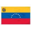 Flag of Venezuela with yellow, blue, and red horizontal stripes.  White stars in the formation of half circle in are the center and a coat of arms is in the top left corner.