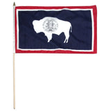 Wyoming state stick flag featuring the white bison silhouette and the full-color state seal on a blue background with red and white borders