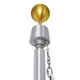 Commercial grade flagpole with a gold-colored ball on top, equipped with a wire cable system.