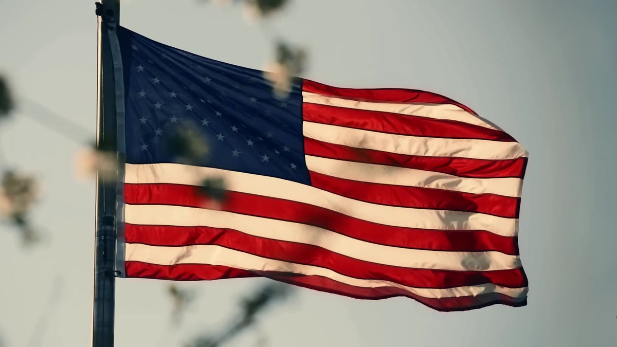 An American flag flying on its pole